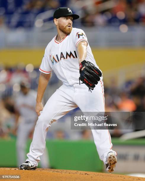 Dan Straily of the Miami Marlins delivers a pitch in the first inning against the San Francisco Giants at Marlins Park on June 14, 2018 in Miami,...