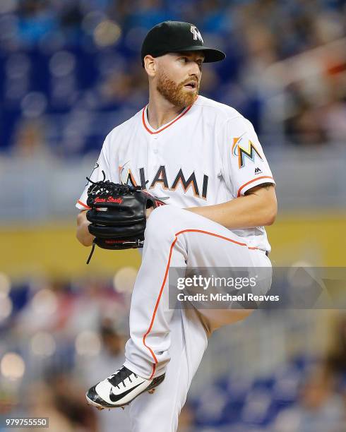 Dan Straily of the Miami Marlins delivers a pitch in the first inning against the San Francisco Giants at Marlins Park on June 14, 2018 in Miami,...