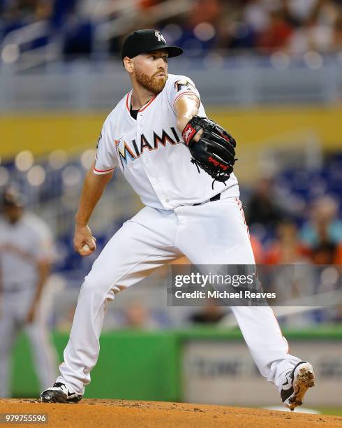 Dan Straily of the Miami Marlins delivers a pitch in the first inning against the San Francisco Giants at Marlins Park on June 14, 2018 in Miami,...