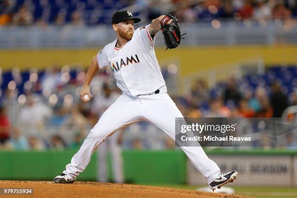 Dan Straily of the Miami Marlins delivers a pitch in the first inning against the San Francisco Giants at Marlins Park on June 14, 2018 in Miami,...