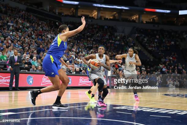 Danielle Robinson of the Minnesota Lynx handles the ball against the Dallas Wings on June 19, 2018 at Target Center in Minneapolis, Minnesota. NOTE...