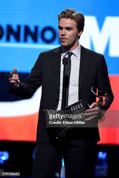 Connor McDavid of the Edmonton Oilers accepts the Ted Lindsay Award, given to the most outstanding player as voted by the NHLPA, at the 2018 NHL...