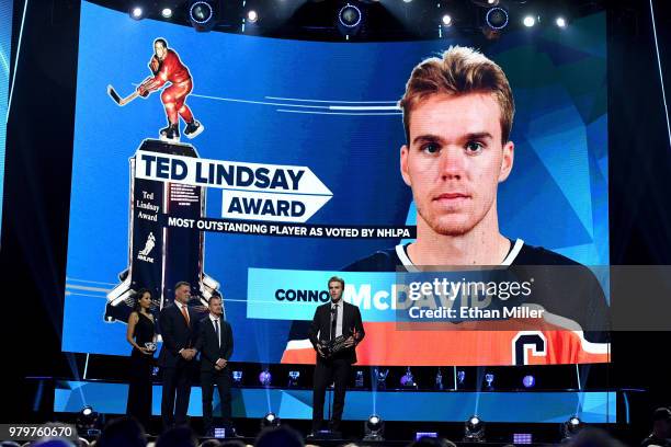 Connor McDavid of the Edmonton Oilers accepts the Ted Lindsay Award, given to the most outstanding player as voted by the NHLPA, at the 2018 NHL...