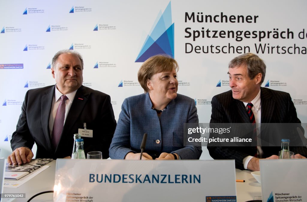 Summit talk on German economy in Munich