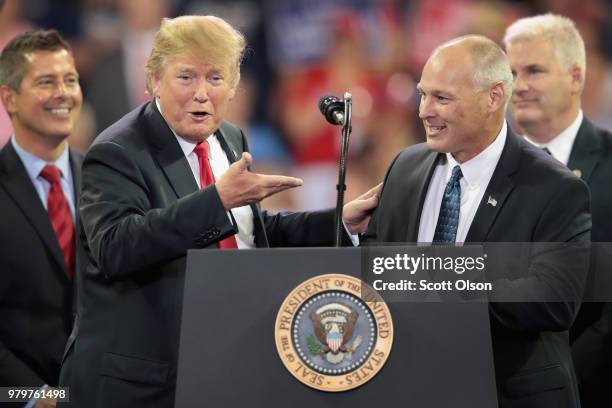 President Donald Trump introduces Pete Stauber, Republican candiate for the U.S. House in Minnesotas 8th District, during a campaign rally at the...