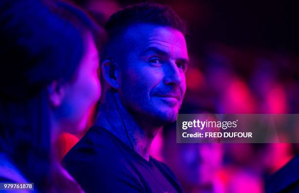 In this photo taken on June 20 former England footballer David Beckham attends a promotional event for a sportswear company and a collegiate football...