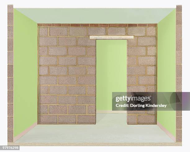 a solid block wall with doorway - cement interior stock illustrations