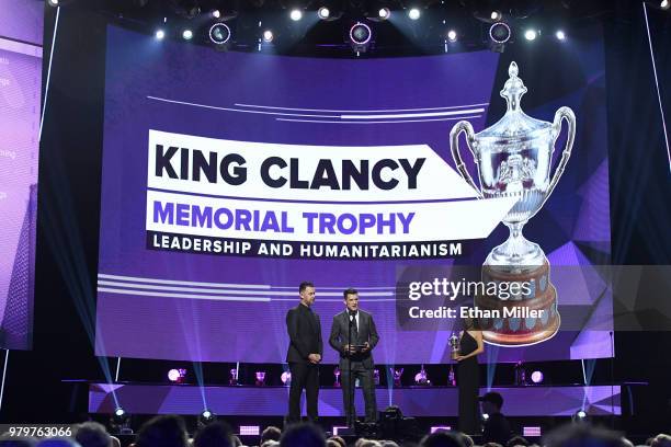 Actor Colin Hanks and former NHL player Andrew Ference present an award onstage at the 2018 NHL Awards presented by Hulu at The Joint inside the Hard...