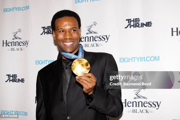 Olympic gold medalist, skater Shani Davis poses on the black carpet at The Shrine in Chicago, Illinois on MARCH 18, 2010.