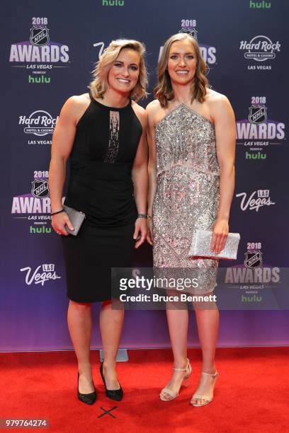 Marie-Philip Poulin and Brianne Jenner of Canada's national women's hockey team arrive at the 2018 NHL Awards presented by Hulu at the Hard Rock...