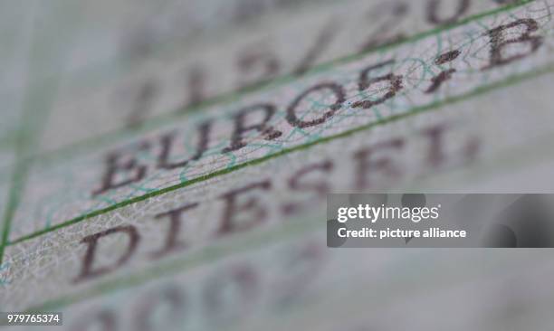 March 2018, Germany, Stuttgart: The words 'Diesel' and 'Euro5' are printed on a registration certificate of a car of the model Volkswagen T5. Photo:...