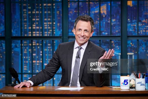 Episode 700 -- Pictured: Host Seth Meyers delivers the monologue from his desk on June 20, 2018 --