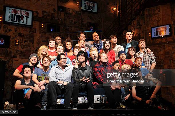 Director Michael Mayer, musicians Billie Joe Armstrong, Mike Dirnt and Tre Cool of the band Green Day pose with the cast of Broadway's "American...