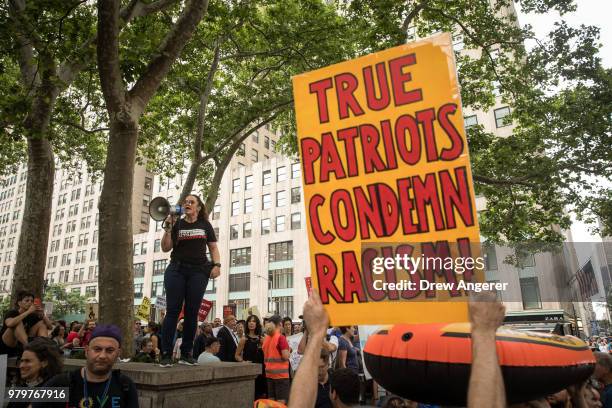 Activists rally to support immigrants and to mark World Refugee Day, June 20, 2018 in Midtown Manhattan in New York City. Bowing to political...