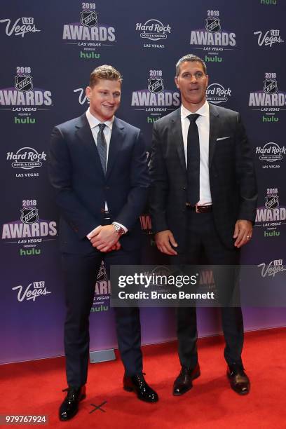 Nathan MacKinnon and coach Jared Bednar of the Colorado Avalanche arrives at the 2018 NHL Awards presented by Hulu at the Hard Rock Hotel & Casino on...