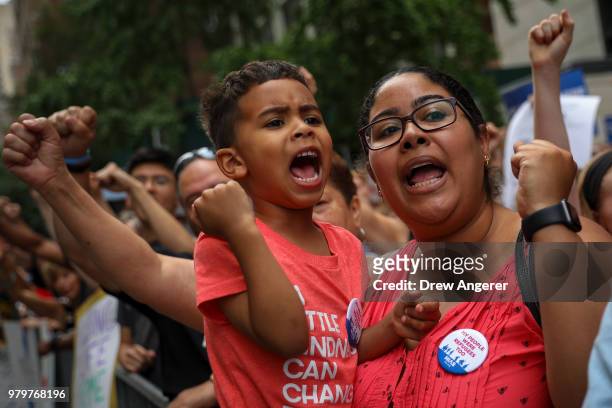 Activists rally in support immigrants and to mark World Refugee Day, June 20, 2018 near the United Nations in New York City. Bowing to political...