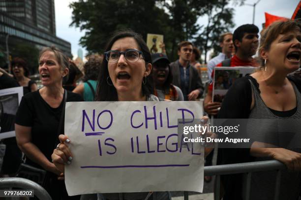 Activists rally to support immigrants and to mark World Refugee Day, June 20, 2018 near Trump World Tower in New York City. Bowing to political...