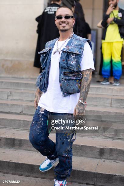 Balvin is seen on the street during Paris Men's Fashion Week S/S 2019 wearing denim on June 20, 2018 in Paris, France.