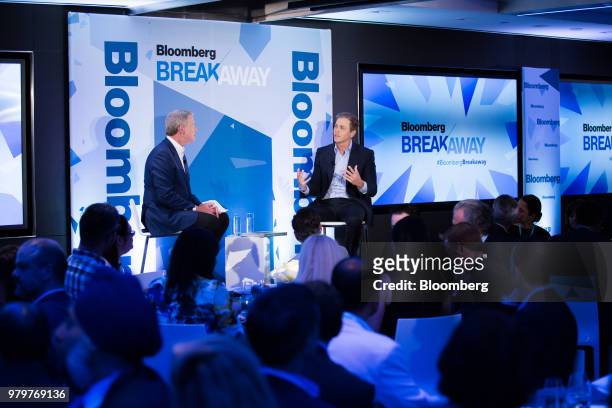 Patrick Whitesell, chairman of William Morris Endeavor Entertainment LLC, center right, speaks during the Bloomberg Breakaway CEO Summit in New York,...