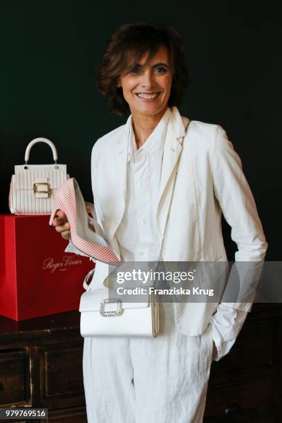 Ines de la Fressange attends the 'Roger Vivier Loves Berlin' event at Soho House on June 20, 2018 in Berlin, Germany.