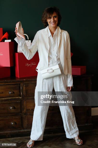 Ines de la Fressange attends the 'Roger Vivier Loves Berlin' event at Soho House on June 20, 2018 in Berlin, Germany.