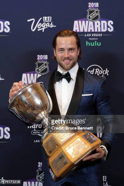 Victor Hedman of the Tampa Bay Lightning poses with the James Norris Memorial Trophy given to the top defenseman in the press room at the 2018 NHL...