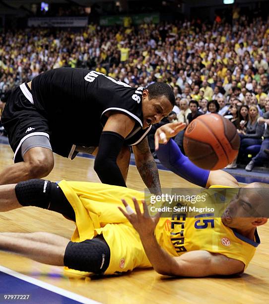 David Bluthenthal, #15 of Maccabi Electra Tel Aviv competes with Lawrence Roberts, #4 of Partizan Belgrade during the Euroleague Basketball 2009-2010...