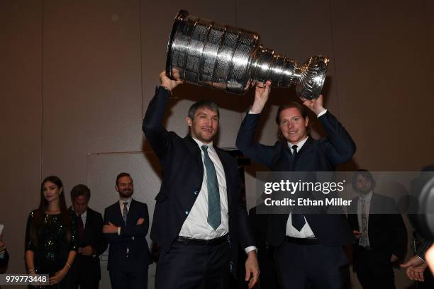 Alex Ovechkin and Nicklas Backstrom of the Washington Capitals arrive at the 2018 NHL Awards presented by Hulu with the Stanley Cup at the Hard Rock...