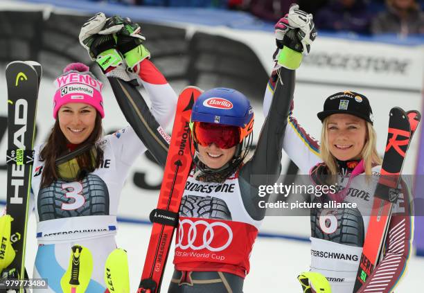 March 2018, Ofterschwang, Germany: Alpine Skiing World Cup, women's slalom. Wendy Holdener of Switzerland, Mikaela Shiffrin of the USA and Frida...