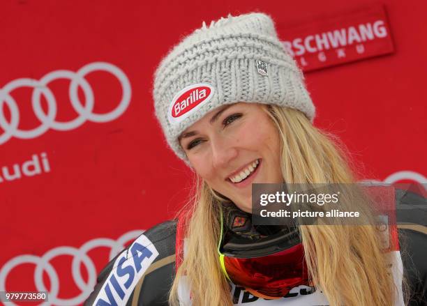 March 2018, Ofterschwang, Germany: Alpine Skiing World Cup, women's slalom. Mikaela Shiffrin of the USA celebrates her win. Photo: Stephan Jansen/dpa