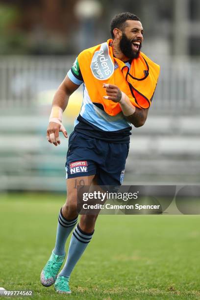 Josh Addo-Carr of the Blues laughs during a New South Wales Blues State of Origin training session at Coogee Oval on June 21, 2018 in Sydney,...