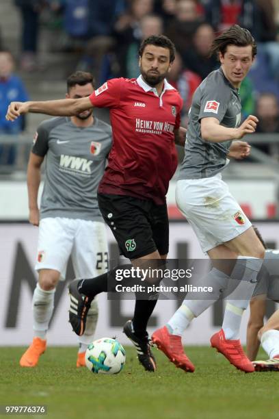 March 2018, Hanover, Germany: Bundesliga football, Hannover 96 vs FC Augsburg at the HDI-Arena. Hannover's Felipe in action against Augsburg's...