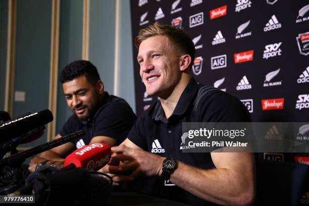 Damian McKenzie of the All Blacks speaks to media alongside Richie Mo'unga during a New Zealand All Blacks press conference on June 21, 2018 in...