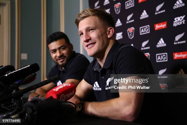 Damian McKenzie of the All Blacks speaks to media alongside Richie Mo'unga during a New Zealand All Blacks press conference on June 21, 2018 in...
