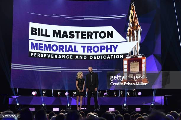 Nicholle Anderson and her husband, Craig Anderson of the Ottawa Senators, present the Bill Masterton Memorial Trophy during the 2018 NHL Awards...