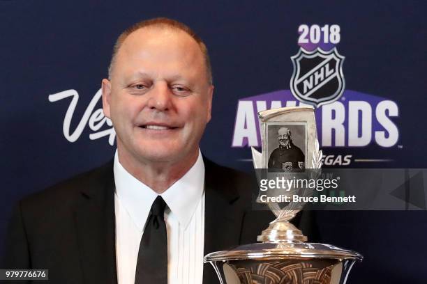 Head coach Gerard Gallant of the Vegas Golden Knights poses with the Jack Adams Award given to the top head coach in the press room at the 2018 NHL...