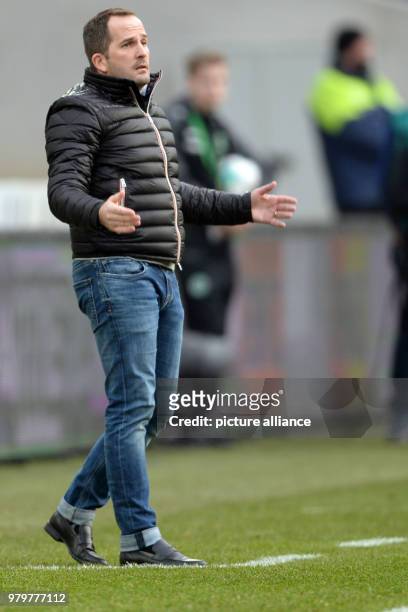 March 2018, Hanover, Germany: Bundesliga football, Hannover 96 vs FC Augsburg at the HDI-Arena. Augsburg coach Manuel Baum pictured pitchside. Photo:...