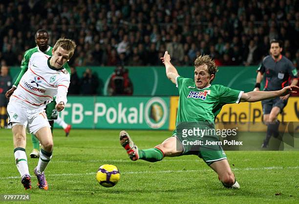 Marko Marin of Bremen scores his team's first goal during the DFB Cup Semi Final match between SV Werder Bremen and FC Augsburg at Weser Stadium on...