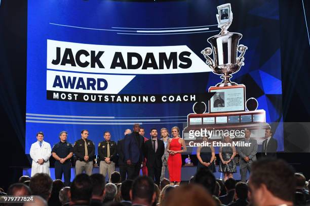 Player Kevin Weekes, UNLV hockey assistant coach Nick Robone, a Las Vegas shooting survivor, and NHL Network host Jamie Hersch present the Jack Adams...