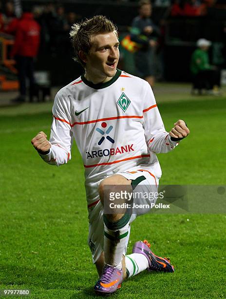 Marko Marin of Bremen celebrates after scoring his team's first goal during the DFB Cup Semi Final match between SV Werder Bremen and FC Augsburg at...
