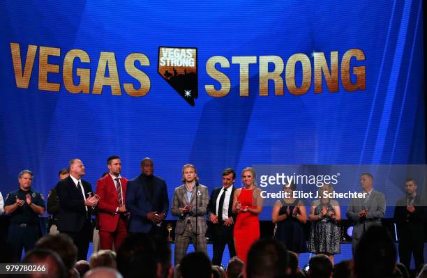 Head coach Gerard Gallant and Deryk Engelland of the Vegas Golden Knights, sportscaster Kevin Weekes, William Karlsson and general manager George...