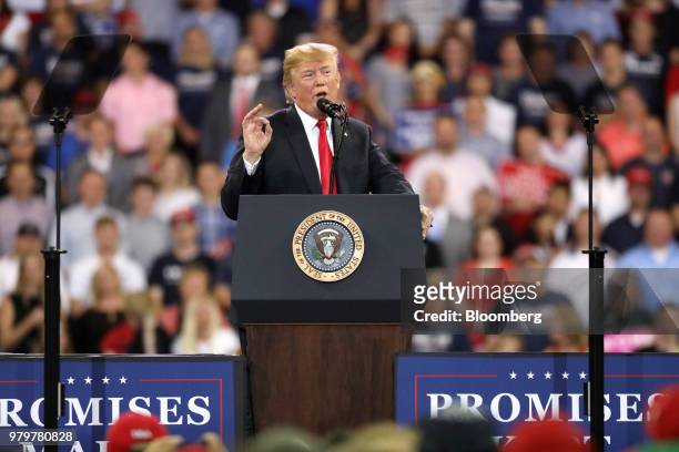 President Donald Trump gestures while speaking onstage during a rally in Duluth, Minnesota, U.S., on Wednesday, June 20, 2018. Trump reversed course...
