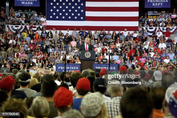 President Donald Trump speaks onstage during a rally in Duluth, Minnesota, U.S., on Wednesday, June 20, 2018. Trump reversed course on his policy...