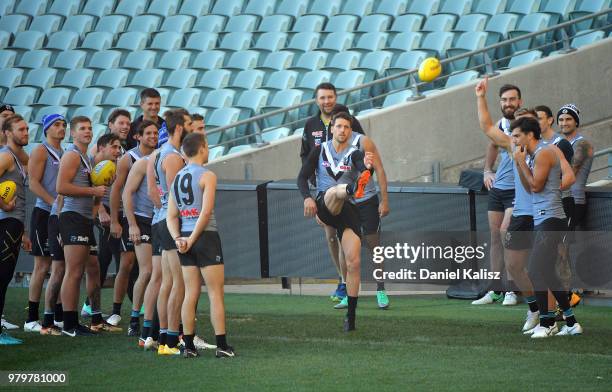 Travis Boak of the Power kicks for goal during a Port Power AFL training session at the Adelaide Oval on June 21, 2018 in Adelaide, Australia.