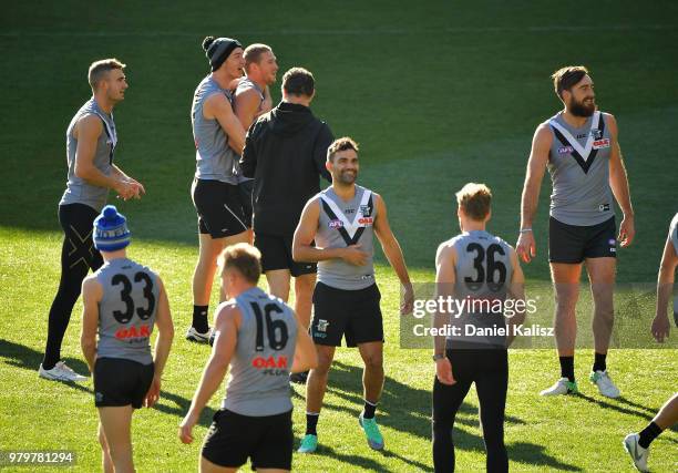 Power players look on during a Port Power AFL training session at the Adelaide Oval on June 21, 2018 in Adelaide, Australia.