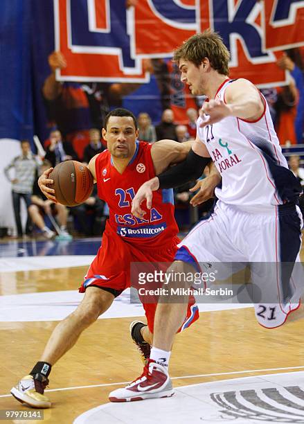 Trajan Langdon, #21 of CSKA Moscow competes with Tiago Splitter, #21 of Caja Laboral in action during the Euroleague Basketball 2009-2010 Play Off...