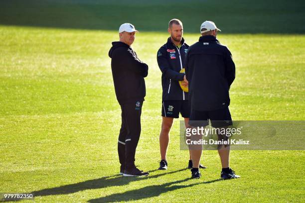 Ken Hinkley the coach of the Power and Scott Thompson Midfield Development coach of the Power are pictured during a Port Power AFL training session...