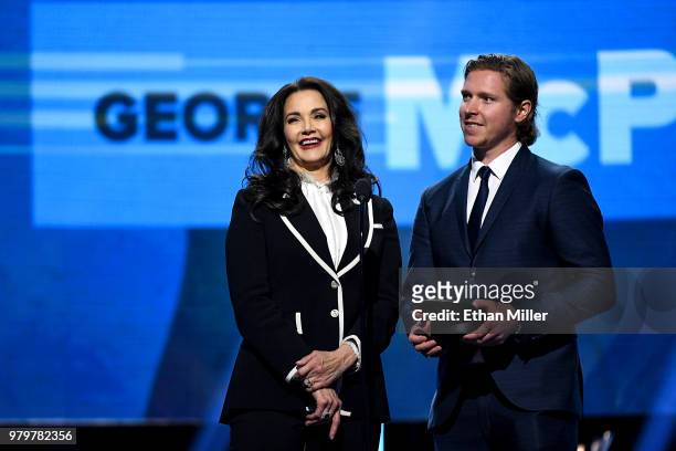 Actress Lynda Carter and Nicklas Backstrom of the Washington Capitals present the NHL General Manager of the Year Award onstage at the 2018 NHL...