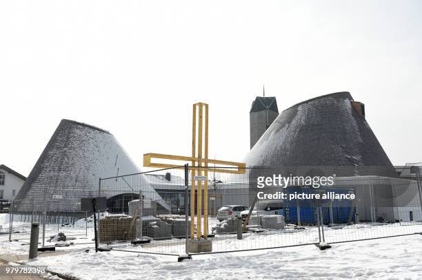 March 2018, Germany, Holzkirchen: The new building of the Catholic Church St. Joseph. The wooden church, whose shape is to remind of the alpine...