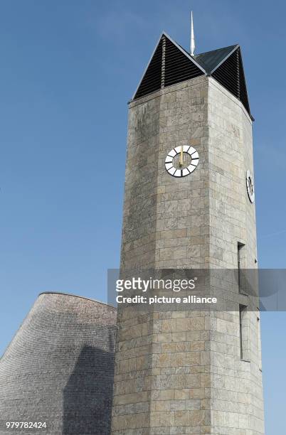March 2018, Germany, Holzkirchen: The tower of the new building of the Catholic Church St. Joseph. The wooden church, whose shape is to remind of the...